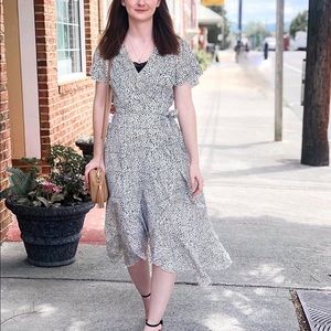 Black and white spotted wrap dress